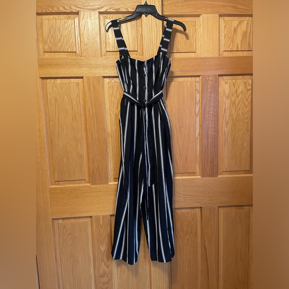Candie’s black and white jumpsuit. Women’s size Medium.